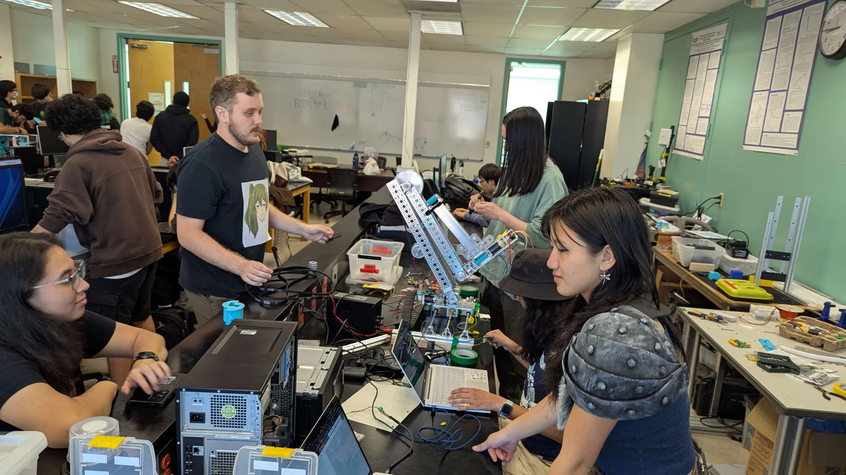 Robotics members working together